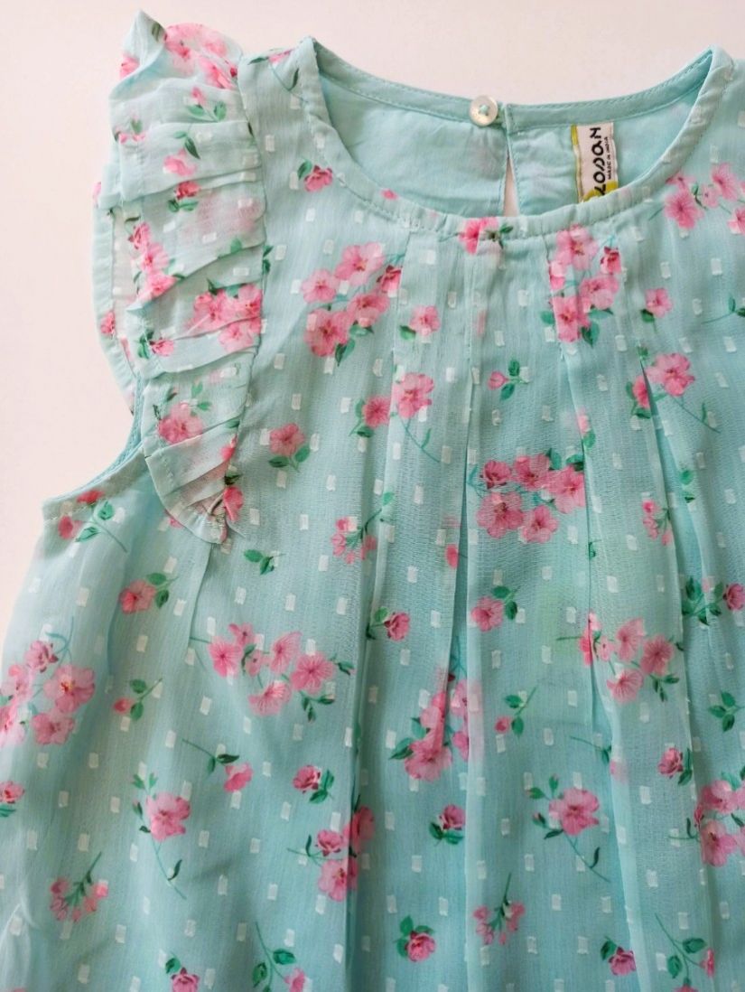 Μπλούζα ζορζέτα φλοράλ με βολάν βεραμάν