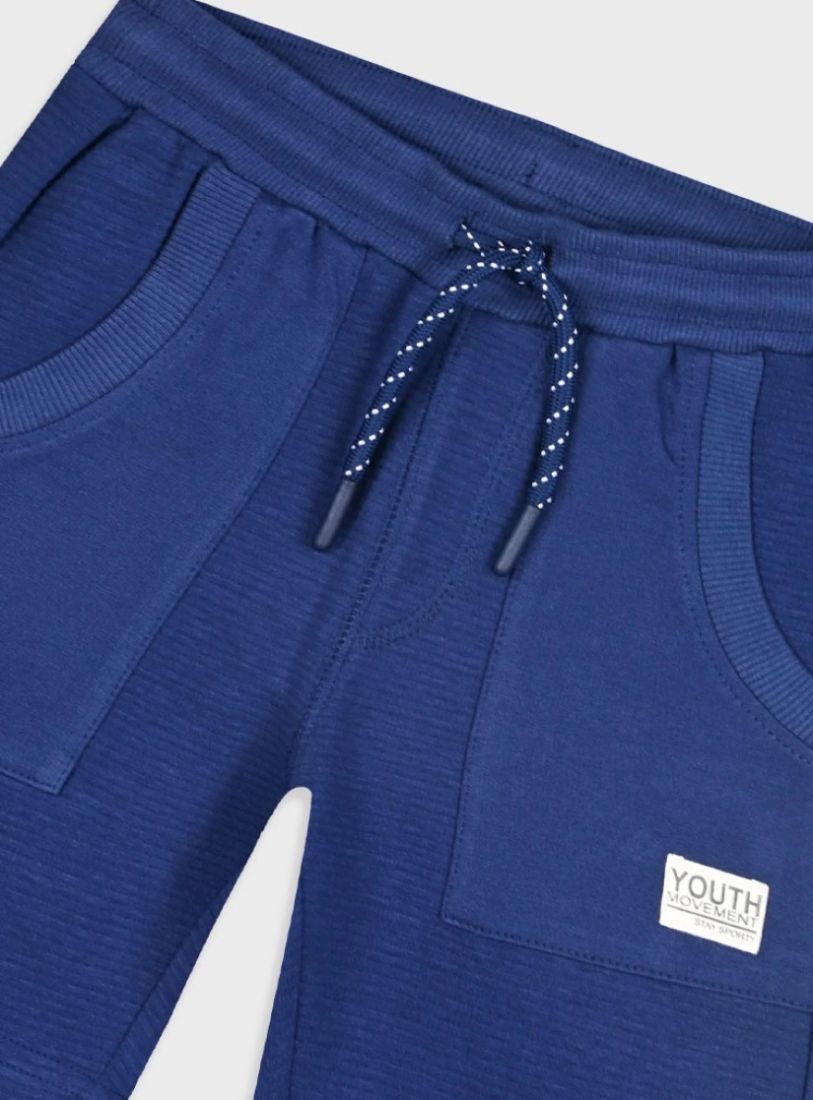 Βερμούδα μονόχρωμη με τσέπες και εφέ ριπ μπλε