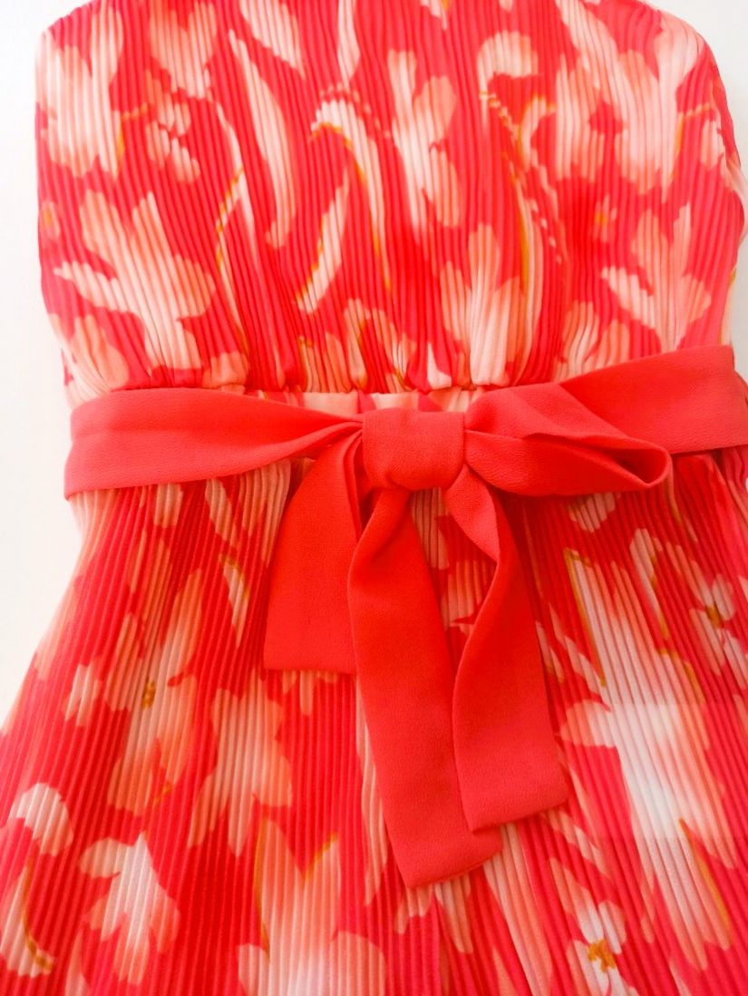 Ολόσωμη φόρμα ζωρζέτα φλοράλ με πλισέ παντελόνα και ζώνη  κοραλί