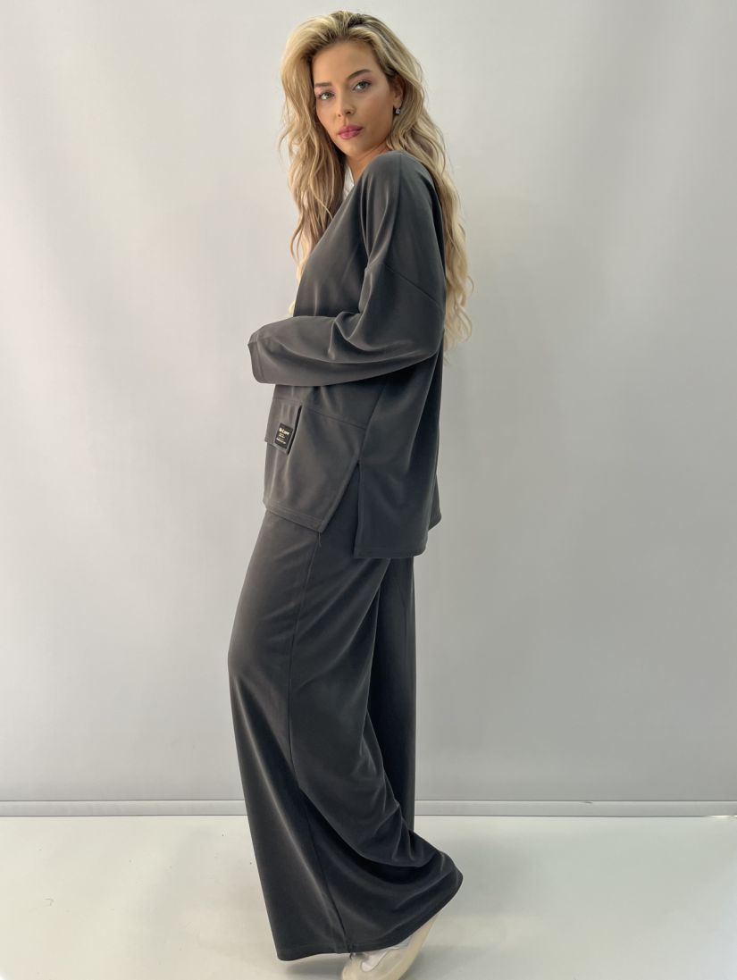 Παντελόνα μονόχρωμη με λάστιχο στη μέση και τσέπες γκρι