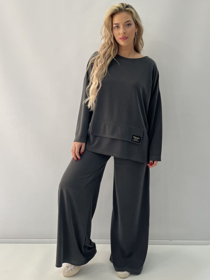 Παντελόνα μονόχρωμη με λάστιχο στη μέση και τσέπες γκρι