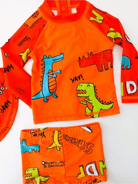 Βρεφικό σετ μπλούζα μαγιώ και σορτς SPF 40+ με print δεινόσαυροι και 3D πλάτη δεινοσαύρου πορτοκαλί